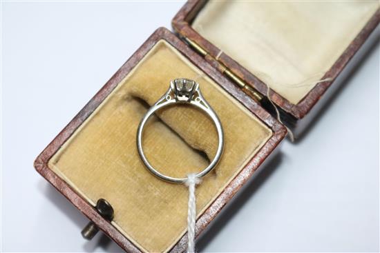 A platinum and solitaire diamond ring, size K.